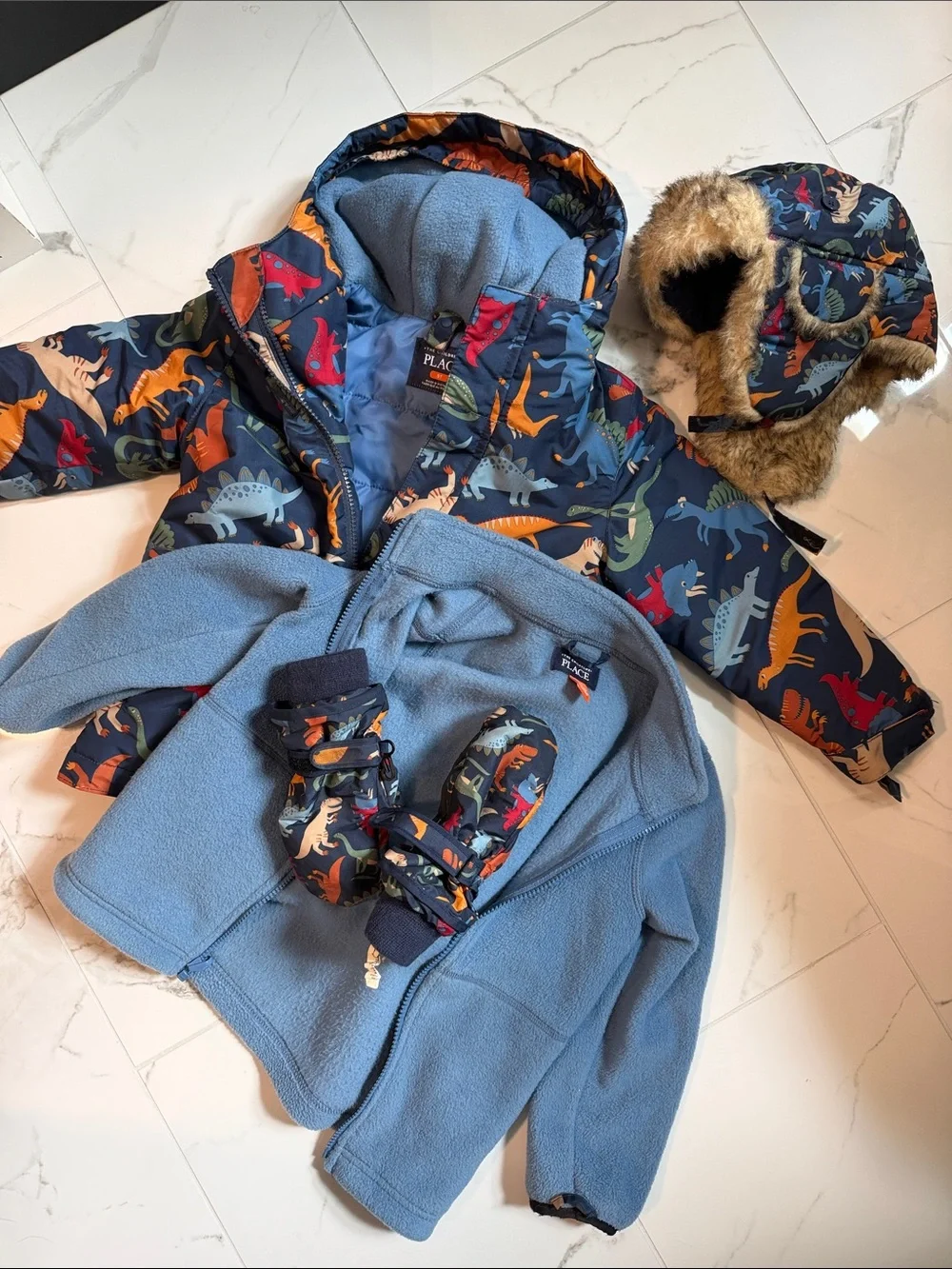 Navy Dino Puffer Jacket Set with hat and gloves.